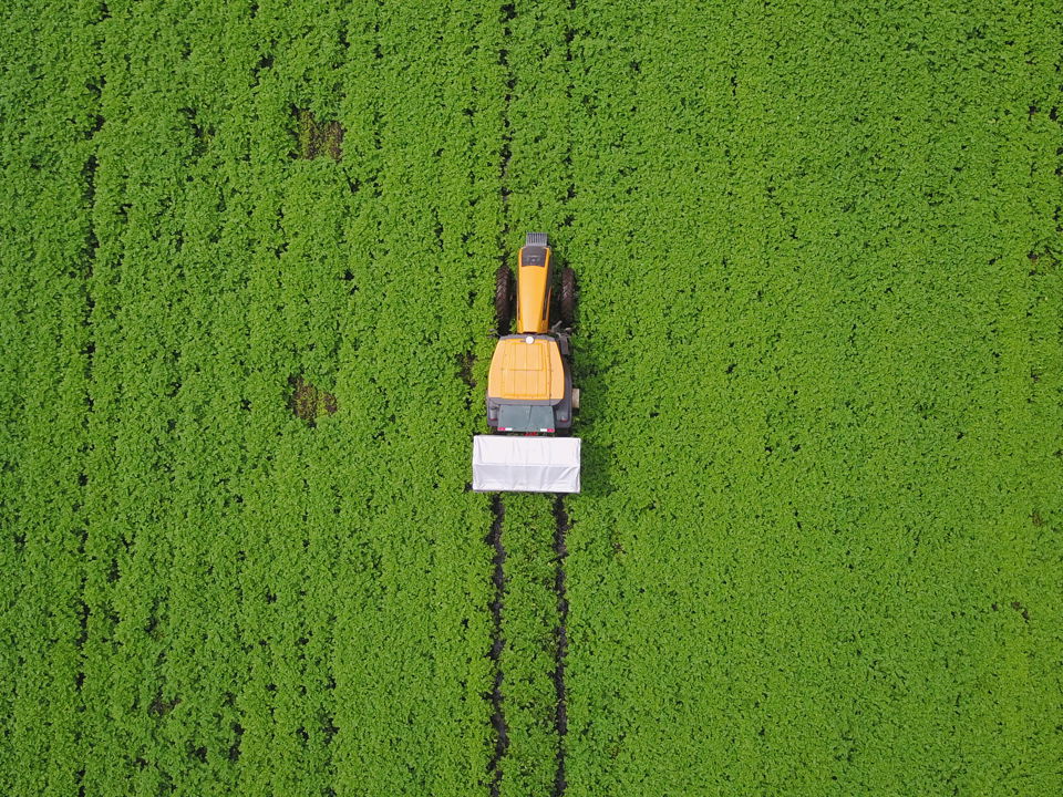 Tractor working in a potato field in Kenya