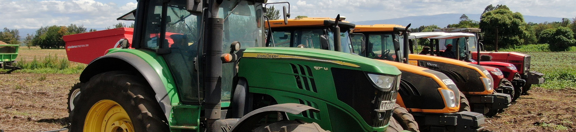 Tractors in field header Agrico PSA